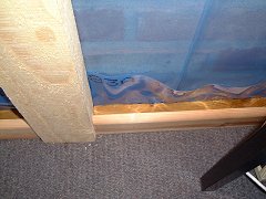 Skirting spaced away from the wall to secure the Soundsorba (12K)